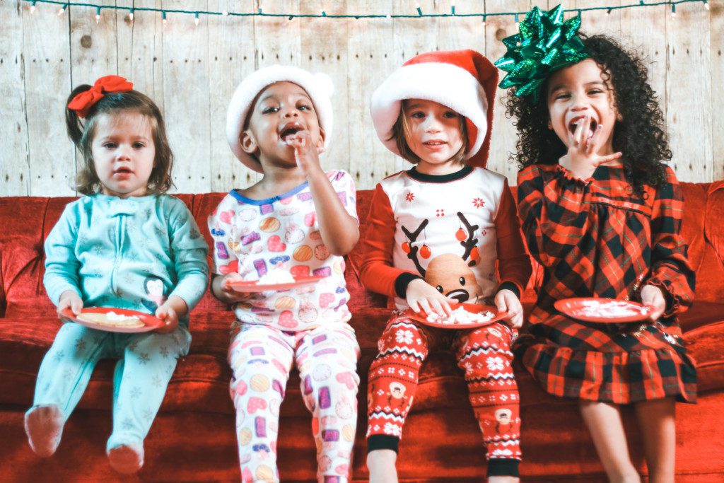 Christmas kids on couch Activities for the Holiday Break: Here Are My Fun & Free Go-Tos MIami Moms Blog