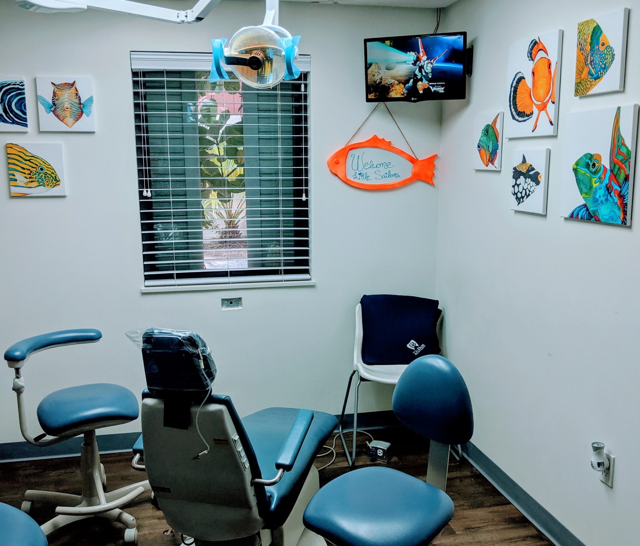 A young girl at the dentist's office (Going Back to the Dentist? 3 Things to Consider | Dr. Bob Pediatric Dentist Lynda Lantz Contributor Miami Mom Collective)