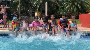 kids playing by the pool 3 Things We Did in Miami While Practicing Social Distancing Janeris Marte Contributor Miami Moms Blog