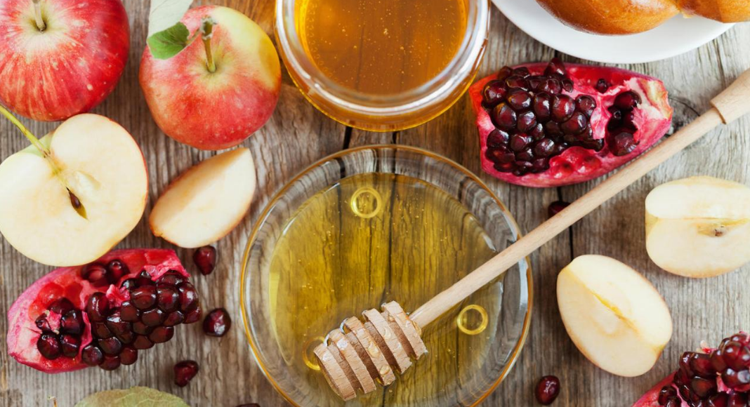 Apples, honey, and pomegranate (Rosh Hashanah: How to Celebrate the Jewish New Year With Kids Bella Behar Contributor Miami Mom Collective)