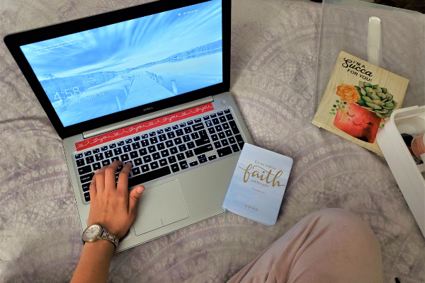 laptop and journal Vision Board: A Simple Beginners Guide to Vision Boards and Goal Setting Minerva Roca Contributor Miami Mom Collective