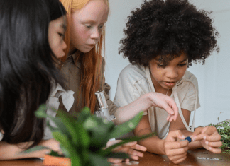 Girls working with plants (International Day of Women and Girls in Science Zoe Costa Contributor Miami Mom Collective)