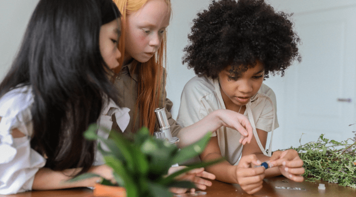 Girls working with plants (International Day of Women and Girls in Science Zoe Costa Contributor Miami Mom Collective)