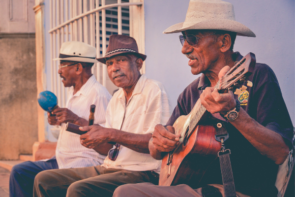Men playing latin music (Lorena Lougedo Contributor Miami Mom Collective)
