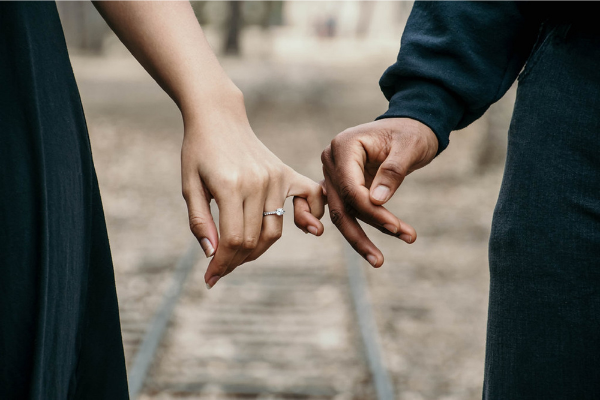 A couple holding hands (Lorena Lougedo Contributor Miami Mom Collective)