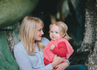 Image: A mother holding her toddler-aged daughter (Single Mom: Loving for Two Kristin Parke Contributor Miami Mom Collective)