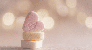 Pastel candy hearts A white lamb (Passover and Easter Nutrition Hacks: Put ALL THE EGGS In Your Basket Monica Moreno Contributor Miami Mom Collective)
