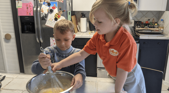 Rachel's kids stirring waffle batter (International Waffle Day: Like Music to My Ears Rachel Hulsund Contributor Miami Mom Collective)