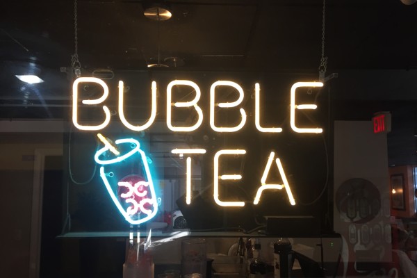 A neon sign that says bubble tea (Bubble Tea: My Epic Quest for the Perfect Boba Combination Kristen Llorca Contributor Miami Mom Collective)