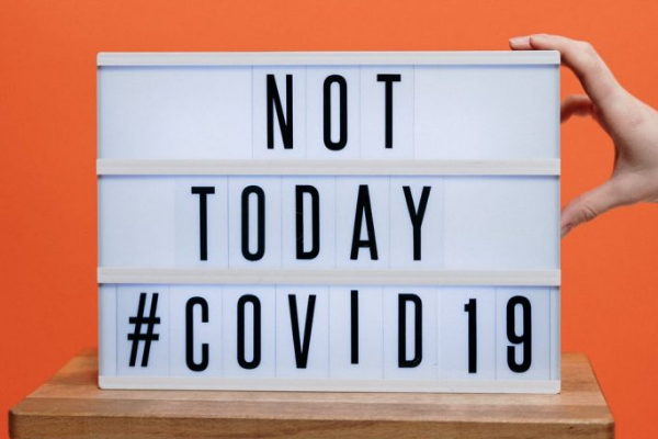 A sign that says, "Not today #COVID19" (Covid-19, Labor & Visitation: What You Need to Know Dianna Hill Contributor Miami Mom Collective)