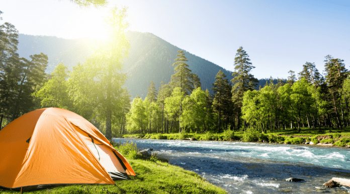 Tent camping in the mountains (Let’s Go Places! 5 Trips to Take Now Vanessa Santamaria Contributor Miami Mom Collective)