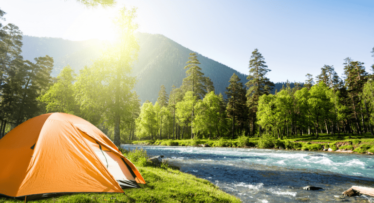 Tent camping in the mountains (Let’s Go Places! 5 Trips to Take Now Vanessa Santamaria Contributor Miami Mom Collective)