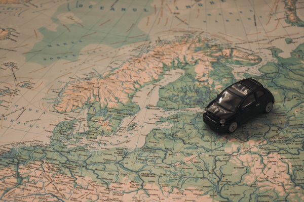 Image: A toy car on a world map