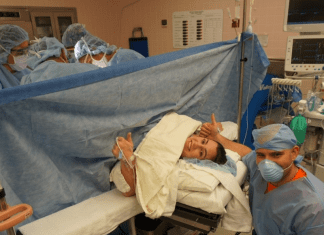 A mom and dad in the OR for a C-section (C-Section Recovery: Taking Care of Yourself So You Can Care For Baby! Alexa Gonzalez Contributor Miami Mom Collective)