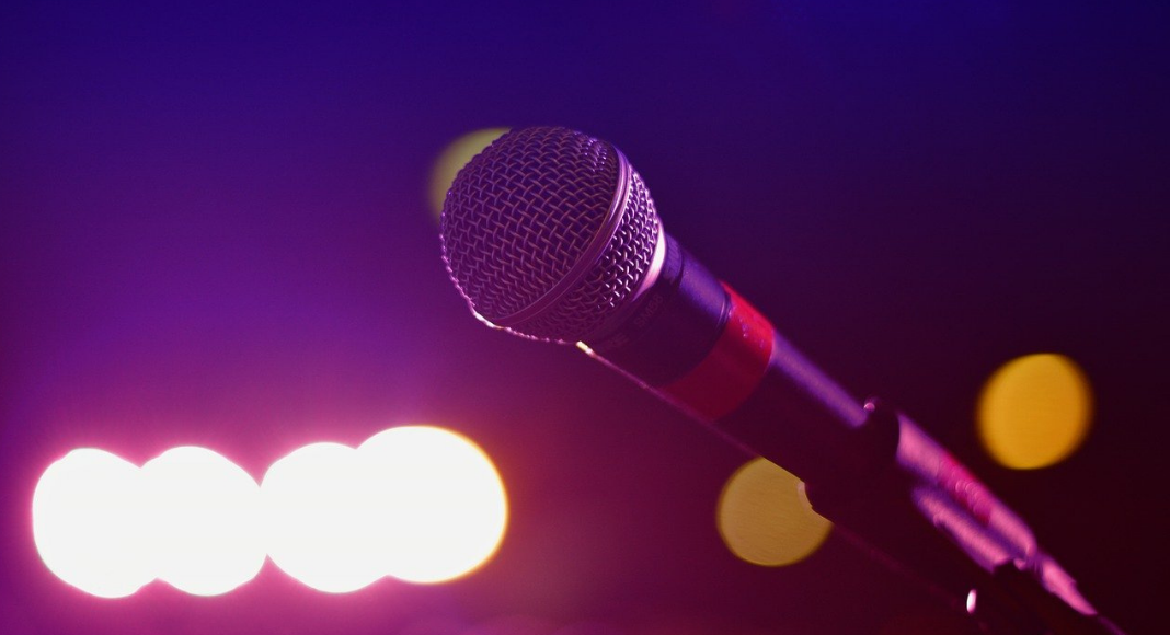 Image: A microphone on a stand (Speak Up: You Matter, Your Opinions Matter Rachelle Haime Contributor Miami Mom Collective)