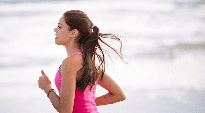 A woman running (Run Like A Mother: A Beginner's Guide to Running Kristen Llorca Contributor Miami Mom Collective)