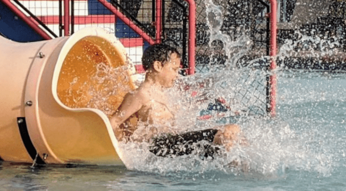 Going down a water slide (Summer Is Almost Here! Are You Ready? | Dr. Bob Pediatric Dentist Lynda Lantz Contributor Miami Mom Collective)