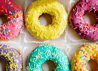A box of donuts with sprinkles (National Donut Day: Make it A-Glaze-ing! Ana-Sofia DuLaney Contributor Miami Mom Collective)