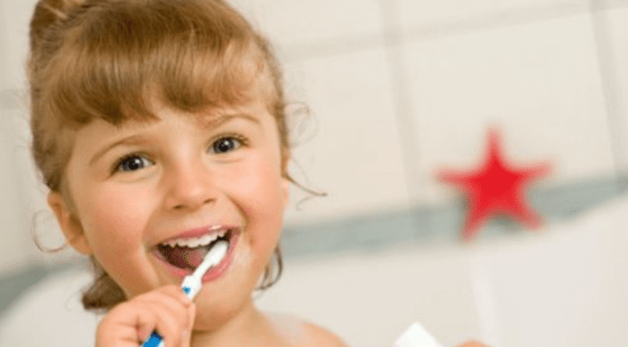 A little girl brushing her teeth (Dr. Bob Unflavored Toothpaste: Sustainable, Fluoridated Cavity Prevention Lynda Lantz Contributor Miami Mom Collective)