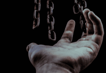 Image: Chains hanging over an open hand