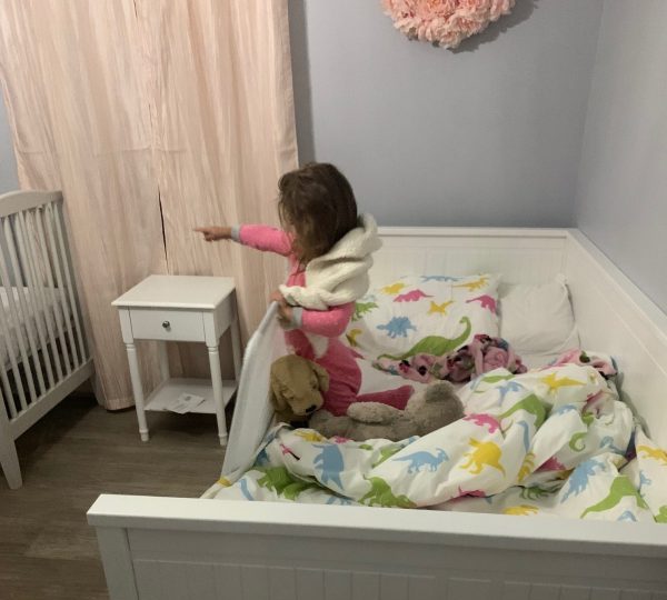 Image: Alexa's toddler enjoying her new big girl bed (A New Roommate and a New Bed (All at Once!): Our Experience Alexa Gonzalez Contributor Miami Mom Collective)