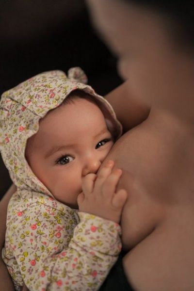 A mother nursing her infant (World Breastfeeding Week: Raising Global Awareness Alexa Gonzalez Contributor Miami Mom Collective)
