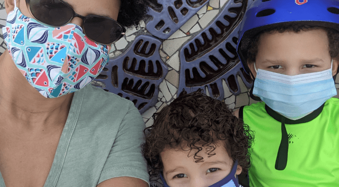 Lynda and her kids wearing their masks (Back to School: Helping Your Kids Succeed | Dr. Bob Pediatric Dentist Lynda Lantz Contributor Miami Mom Collective)