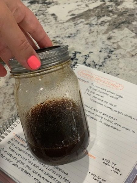 A jar of homemade pumpkin syrup (Pumpkin + Cold Brew: How To Make this Popular Fall Coffee at Home! Alexa Gonzalez Contributor Miami Mom Collective)