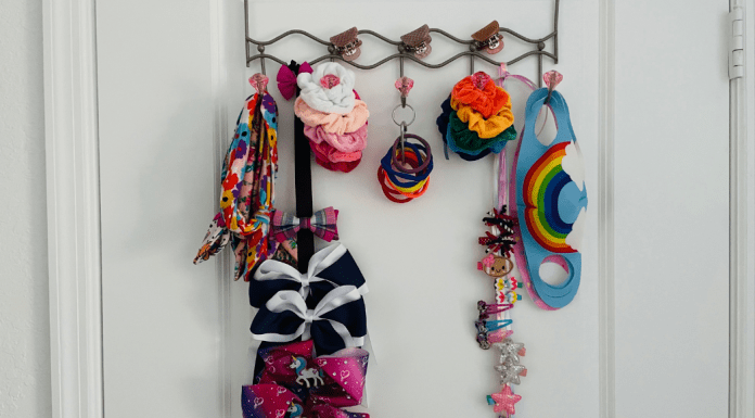 An example of a DIY hair accessory organizer for hair bows, hair ties, scrunchies, and face masks