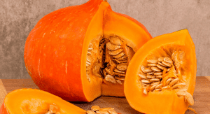 A sliced pumpkin with seeds (Fall's Most Fabulous Superfoods Your Plate Needs Monica Moreno Contributor Miami Mom Collective)