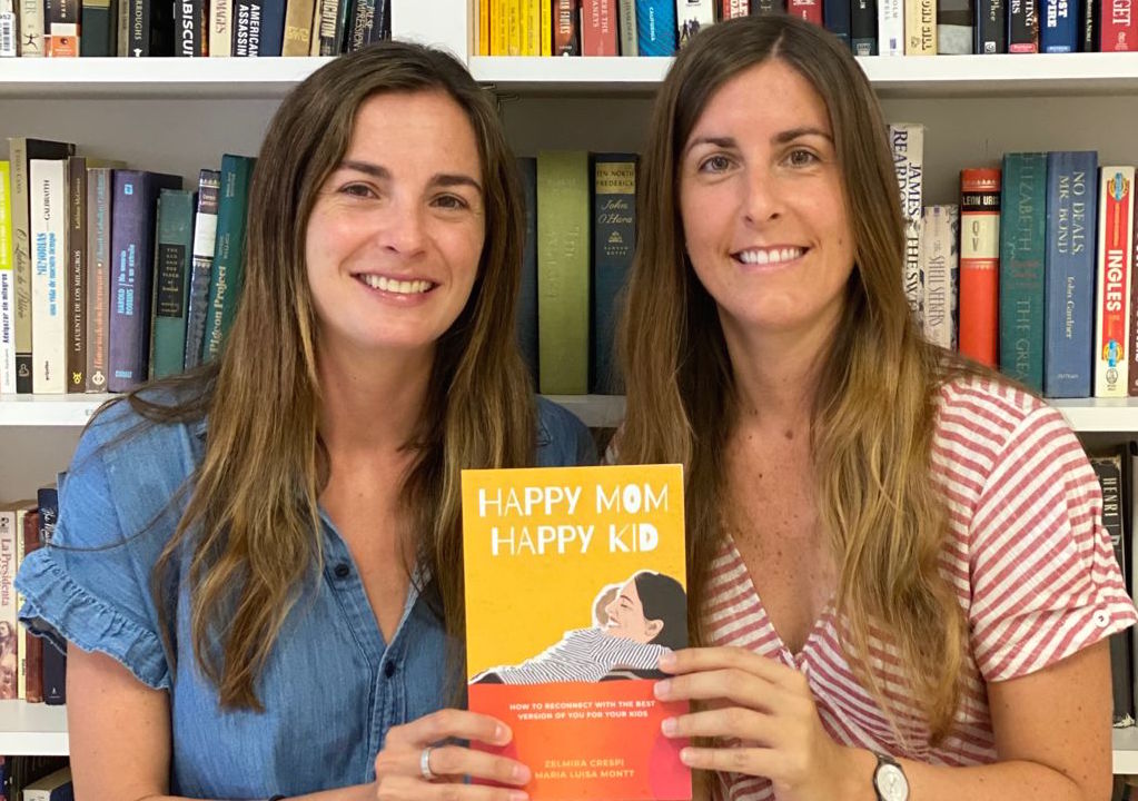 Authors Zelmira Crespi and Maria Montt with their new book (Identity: Forgetting the Taboo and Embracing Our Identity as Women Miami Mom Collective)