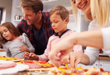 Image: A family making homemade pizza together (Pizza Night: 10 Homemade Pizza Ideas for a Fun Family Friday Night Lorena Lougedo Contributor Miami Mom Collective)