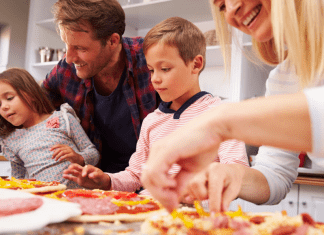 Image: A family making homemade pizza together (Pizza Night: 10 Homemade Pizza Ideas for a Fun Family Friday Night Lorena Lougedo Contributor Miami Mom Collective)