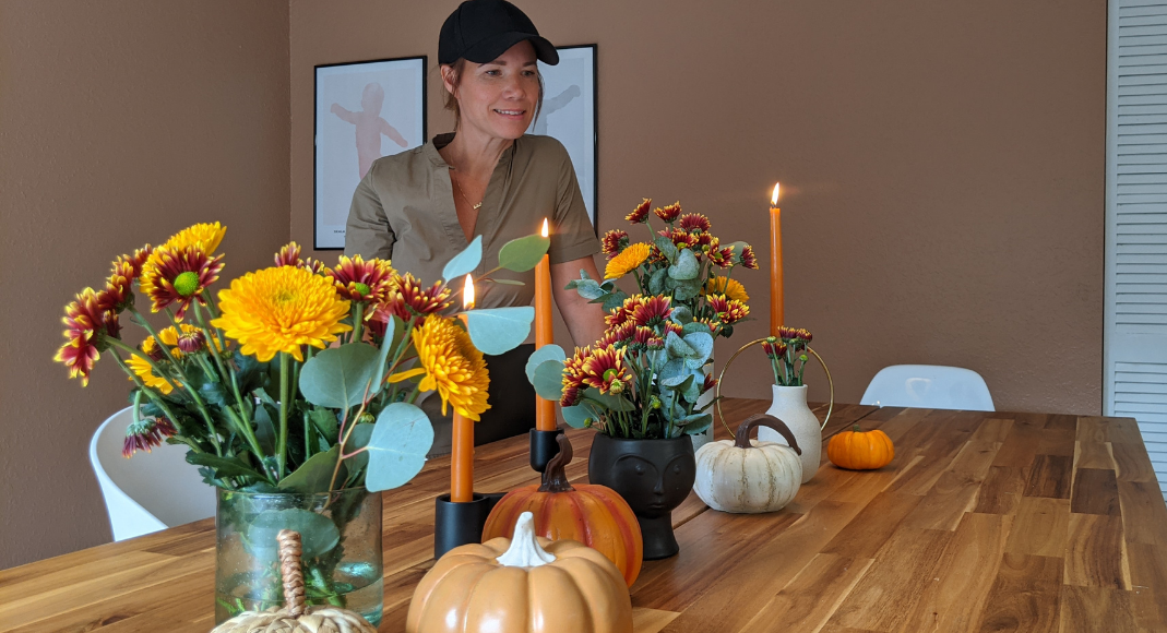 Image: Rachel decorating her dining table with fall flowers (Get the Fall Feeling in Miami Rachel Hulsund Contributor Miami Mom Collective)