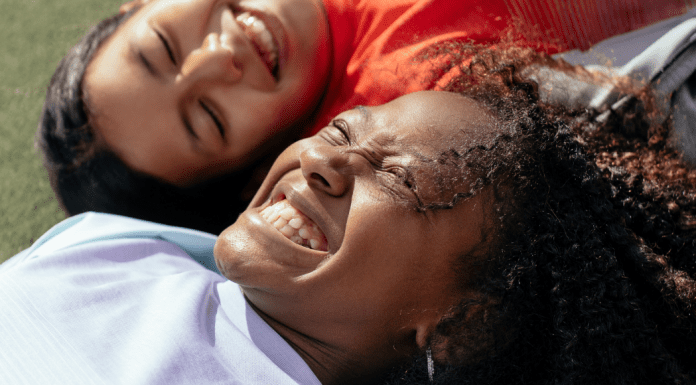 Image: Two multiethnic girls laughing and smiling together (Dental Hygiene Month: Brush Up on Oral Care | Dr. Bob Pediatric Dentist Lynda Lantz Contributor Miami Mom Collective)