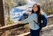 MMC Contributor Rachel Santos at a waterfall in Asheville, NC