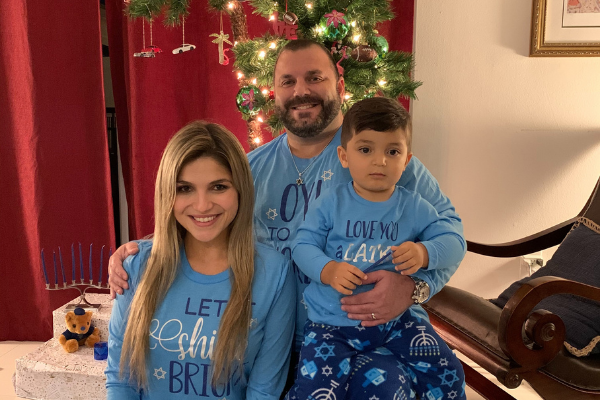 Image: Bella and her family in matching Chanukah PJs