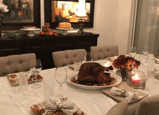 Image: A dining room table set for a Friendsgiving meal
