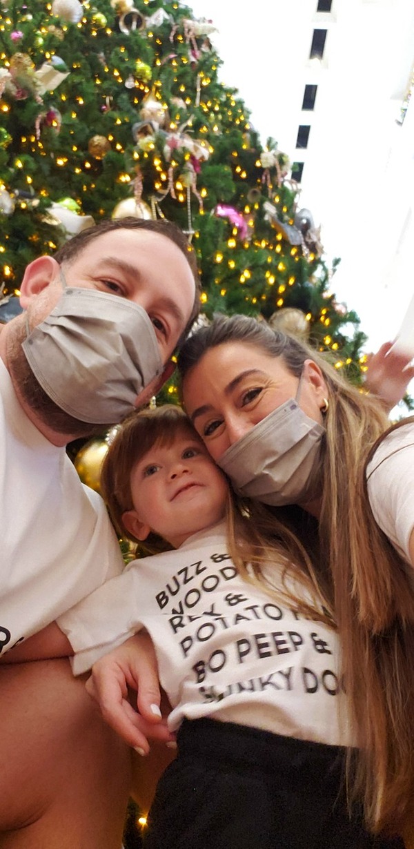 Image: Jacqueline with her husband and son in front of Disney's Grand Floridian's Christmas tree (Disney For The Holidays, and Some Magical Tips Sandra Jacquemin Contributor Miami Mom Collective)