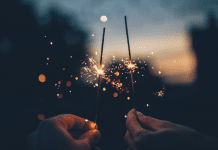Image: Two hands holding sparklers (Blessings of 2021: A Season Not Wasted Kristin Parke Contributor Miami Mom Collective)