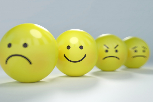 Image: Yellow emojis depicting different emotions (Toxic Positivity: How to Stay True to Yourself Bella Behar Contributor Miami Mom Collective)
