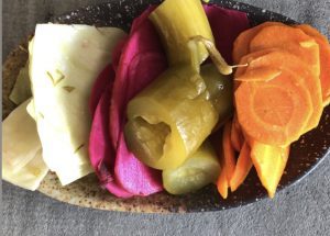 A plate of assorted pickled vegetables