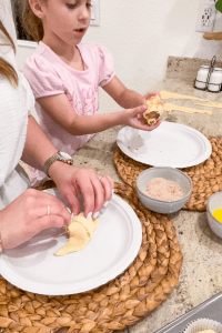Mother and daughter making a Resurrection Rolls together