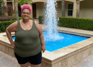Natasha, standing in front of a fountain