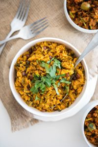 A bowl of colorful arroz con gandules