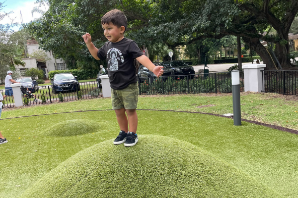 A little boy plays at Salvadore Park in Coral Gables