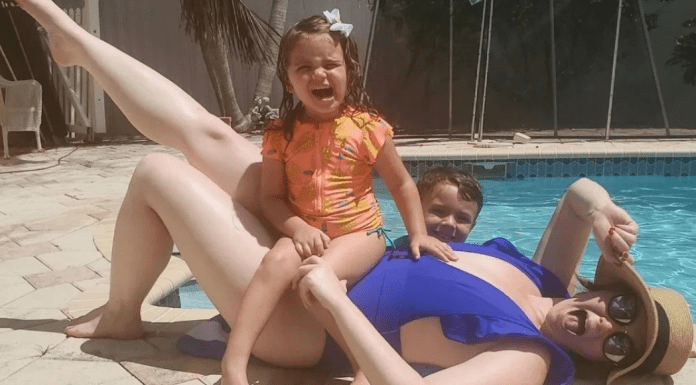 A woman with kids by the pool, embracing her summer beach body