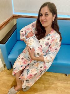 Rachel holding her new baby