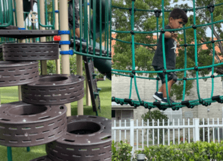 A little boy plays at a local playground