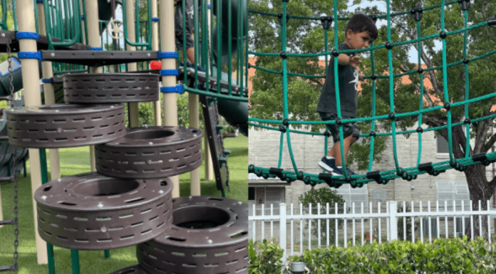 A little boy plays at a local playground